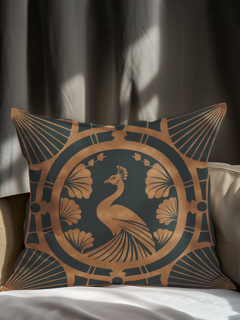 Square pillow cover featuring a stylized copper peacock design centered in a medallion, surrounded by Art Deco fan patterns and shell motifs on a dark forest green background.